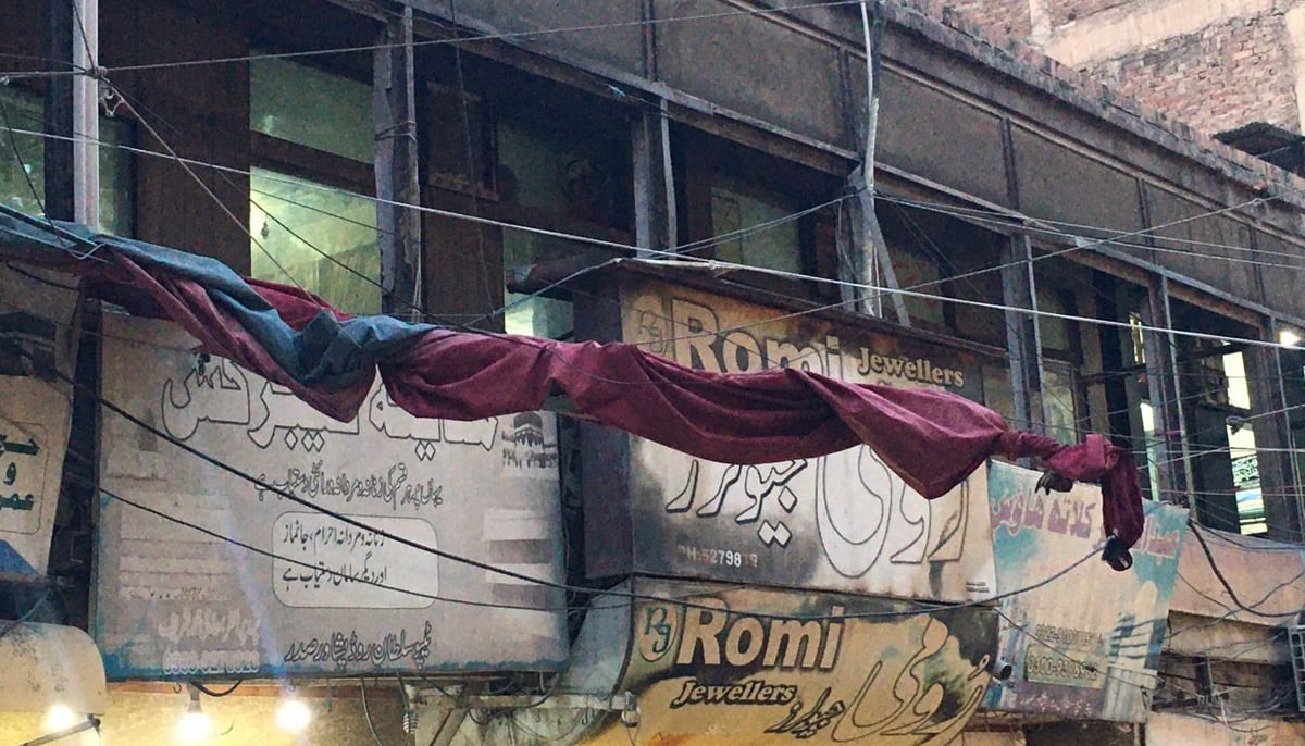 The cloth shop now stands where once Moti Mahal dhaba was housed on a street in Saddar Bazaar. — Photo by Geo News