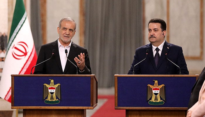 Iranian President Masoud Pezeshkian (L) and Iraqi Prime Minister Mohammed Shia al-Sudani attend a press conference at the government palace in Baghdad, Iraq on September 11, 2024. — Reuters