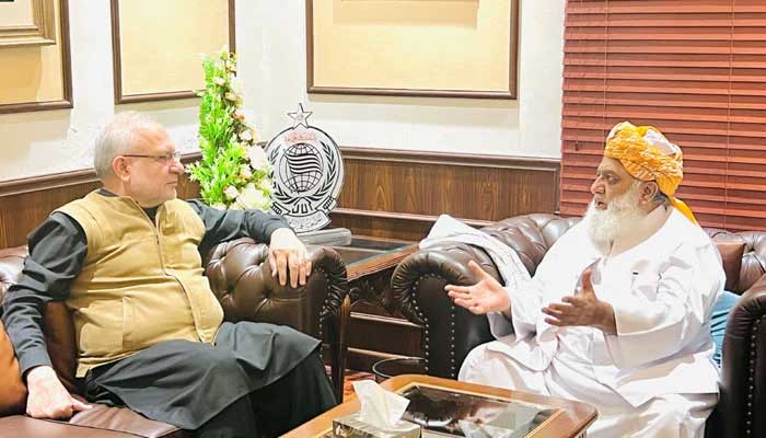 Former senator Muhammad Ali Durrani calls on JUI-F Maulana Fazlur Rehman at his residence in Islamabad on October 24, 2023. — X/@juipakofficial/File