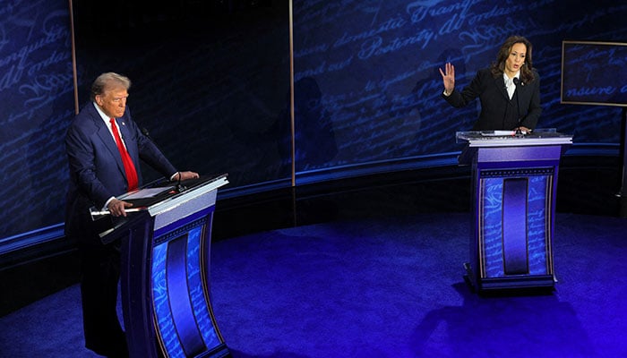 Democratic presidential nominee, US Vice President Kamala Harris speaks during a presidential debate hosted by ABC as Republican presidential nominee, former US President Donald Trump listens, in Philadelphia, Pennsylvania, US, September 10, 2024. — Reuters