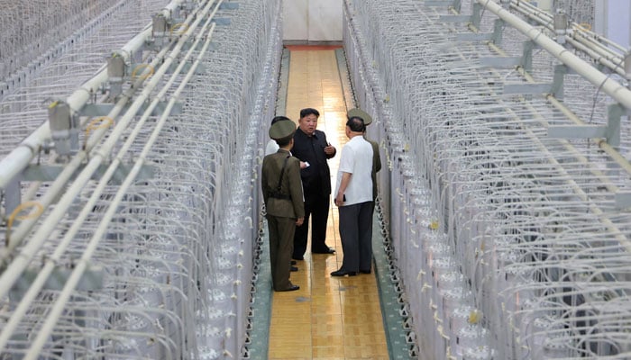 North Korean leader Kim Jong Un tours facilities during a visit to the Nuclear Weapons Institute and the production base of weapon-grade nuclear materials at an undisclosed location in North Korea, in this photo released by North Koreas official Korean Central News Agency September 13, 2024. — AFP