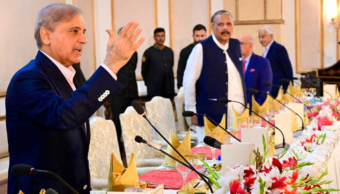 Prime Minister Shehbaz Sharif addresses a banquet he hosted in honor of parliamentarians in Islamabad on September 14, 2024. — PMO