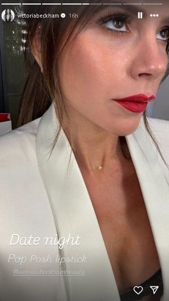 Victoria Beckham shows off her red bold lipstick