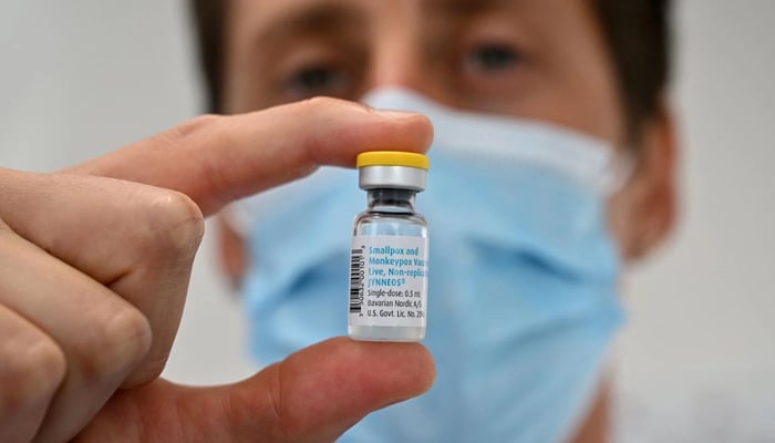 A health official holding a vial of mpox vaccine of Jyennos. — AFP/File