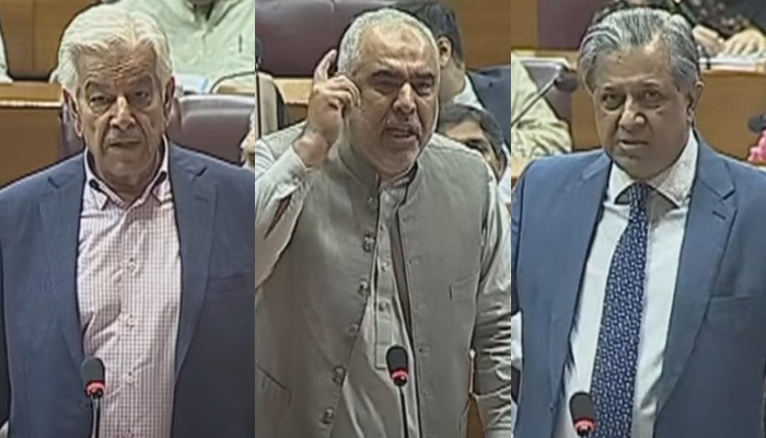 Defence Minister Khawaja Asif (left) PTIs Asad Qaiser (centre) and Federal Law Minister Azam Nazeer Tarar speak during NA session in Islamabad on September 16, 2024. — Screengrab via YouTube/@NaofPakistan