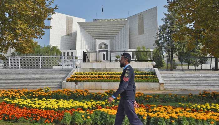 A policeman walks past the Supreme Court building in Islamabad in this undated photo — AFP/File