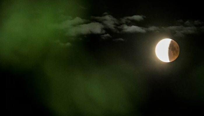 A blood moon lunar eclipse is seen near Roskilde, Denmark. Mads Claus. — Reuters/File