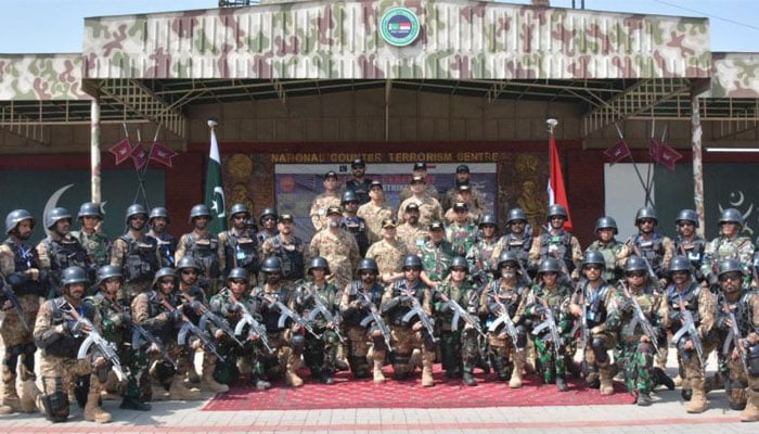 Pakistan Army and Indonesian Armed Forces personnel seen in this image from the closing ceremony of joint military exercise. — ISPR