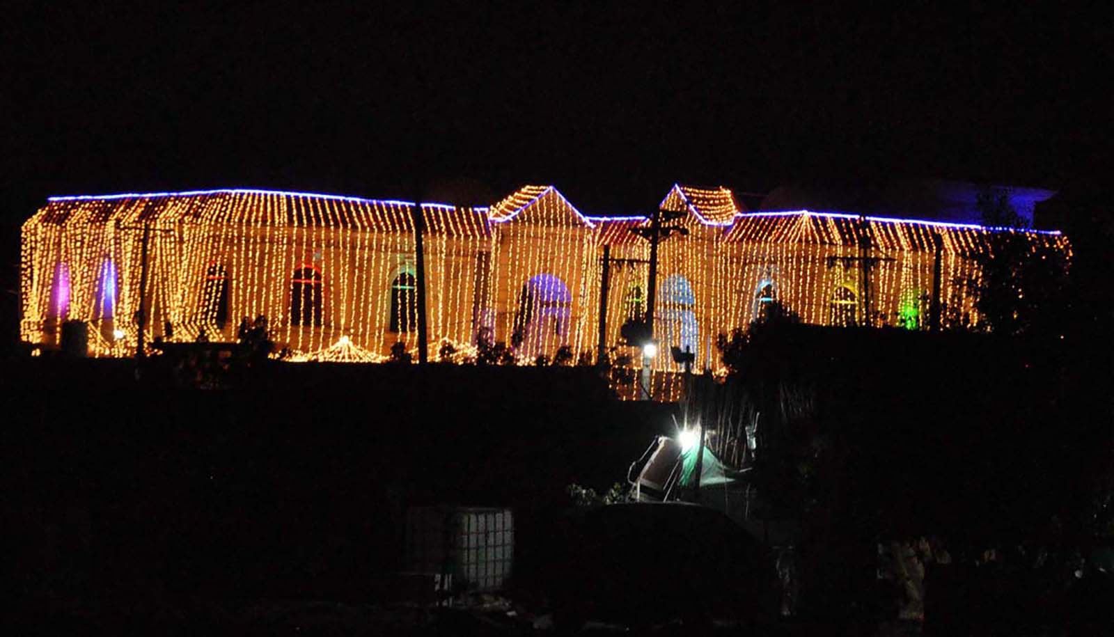 A government building in Hyderabad, Pakistan illuminated with lights in celebration of 12th Rabi-ul-Awwal on September 16, 2024. — PPI