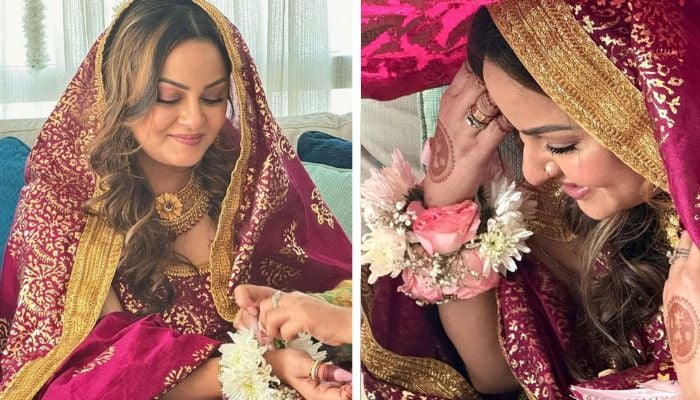 Pakistani actor Javeria Abbasi gestures for photographs during a her Nikah ceremony. — Instagram/@juvariaabbasi