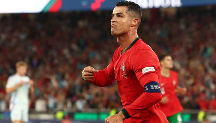 Portugals Cristiano Ronaldo celebrates scoring their second goal during a UEFA Nations League match against Scotland at Estadio da Luz in Lisbon, Portugal on September 8, 2024. — Reuters