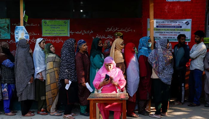 Kashmiri women stand in a queue to vote at a polling station, during the first phase of assembly election, in Kokernag, Indian Illegally Occupied Jammu and Kashmir (IIOJK) on September 18, 2024. — Reuters