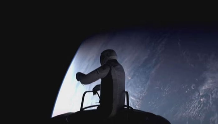 Jared Isaacman, 41, exits the SpaceX capsule on a tether into the vacuum of space during the worlds first private spacewalk on September 12, 2024, in a still image from video. — Reuters