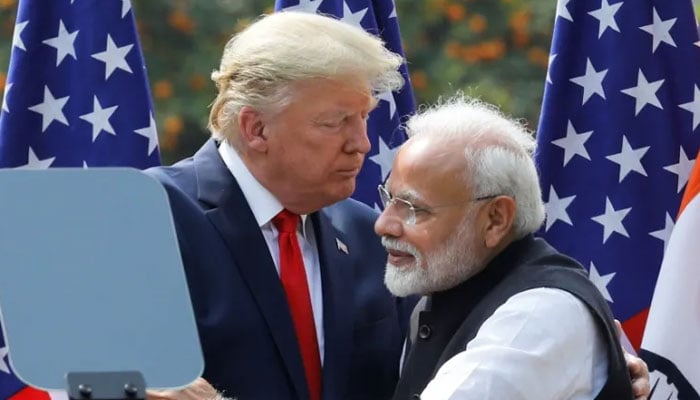 US President Donald Trump and Indias Prime Minister Narendra Modi embrace during a joint news conference after bilateral talks in New Delhi on February 25, 2020. — Reuters