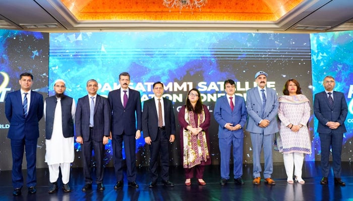 Minister of State for Information Technology and Telecommunication, Shaza Fatima Khawaja (Centre) stands alongside attendees of the PAKSAT-MM1 Satellite Application Conference on September 18, 2024. — X/@jameelaq