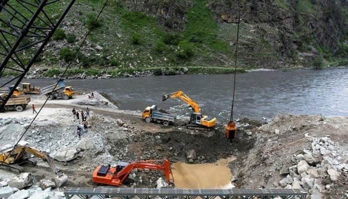 A representational image showing excavators being used at the dam site of Kishanganga power project in Gurez, Srinagar in IIOJK on June 21, 2012. — Reuters