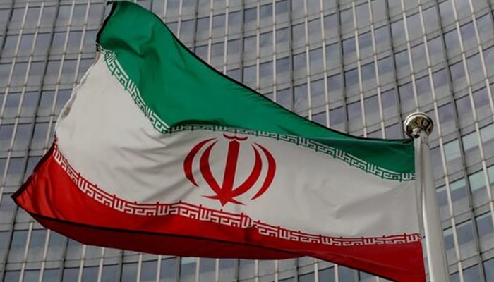 An Iranian flag flutters in front of the International Atomic Energy Agency (IAEA) headquarters in Vienna, Austria on September 9, 2019. — Reuters