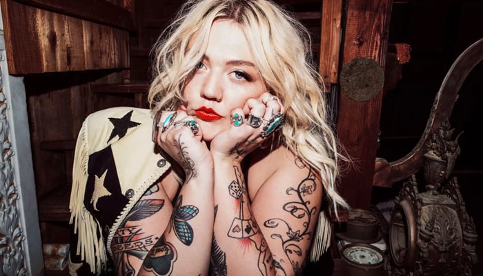 Elle King details how a phrase led to the birth of latest song High Road