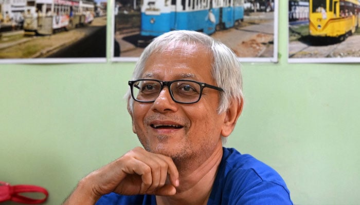 Debashish Bhattacharyya, president of the Calcutta Tram Users Association (CTUA), speaks during an interview with AFP at his office in Kolkata on September 8. —AFP