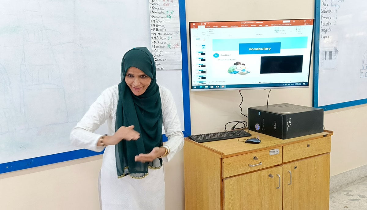 Riffat Niaz teaches an Urdu lesson to deaf students at Deaf Reach School in Karachi on September 19, 2024. — Photo by author