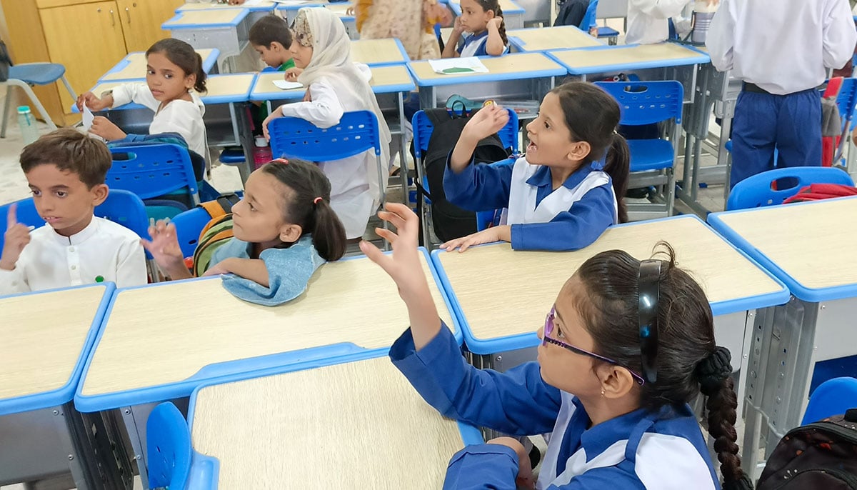 Deaf children learn signs at Deaf Reach School in Karachi on September 19, 2024. — Photo by author