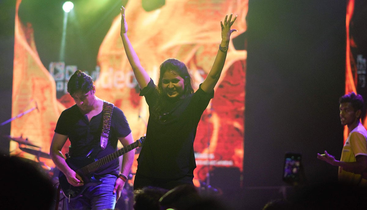 A Conenct Hear Sign Language Interpreter at a concert for Deaf people. — Supplied