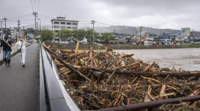 Floods, landslides hit central Japan months after major quake