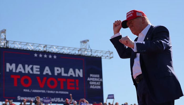 Republican presidential nominee and former US President Donald Trump gestures at a campaign rally in Wilmington, North Carolina, US, September 21, 2024. — Reuters