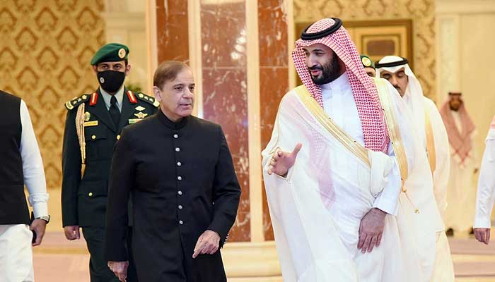 Saudi Crown Prince Mohammad Bin Salman receives PM Shehbaz Sharif upon his arrival for a state visit on April 30, 2022. — PM Office