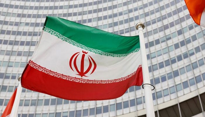 The Iranian flag waves in front of the International Atomic Energy Agency (IAEA) headquarters, amid the coronavirus disease (COVID-19) pandemic, in Vienna, Austria May 23, 2021. — Reuters