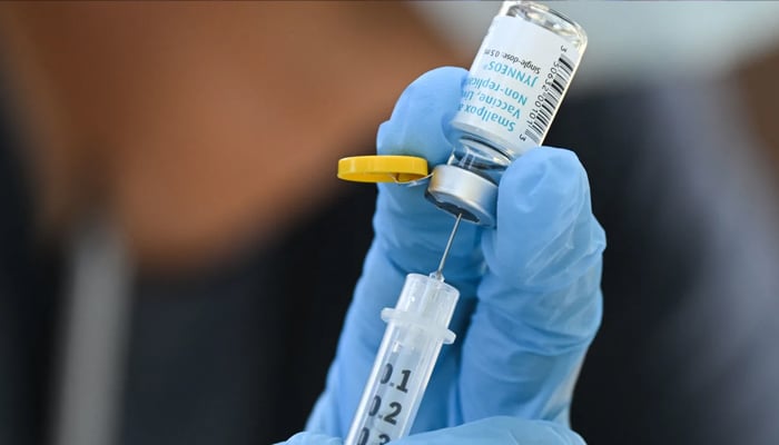 A health care worker prepares a dose of the Jynneos mpox vaccine at a pop-up vaccination clinic in Los Angeles, California, on August 9, 2022. — Reuters