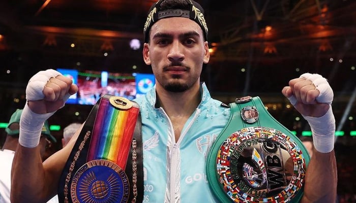 Hamzah Sheeraz posing with his belts after clinching the Middleweight European Boxing title. — Hamzah Sheeraz management/File