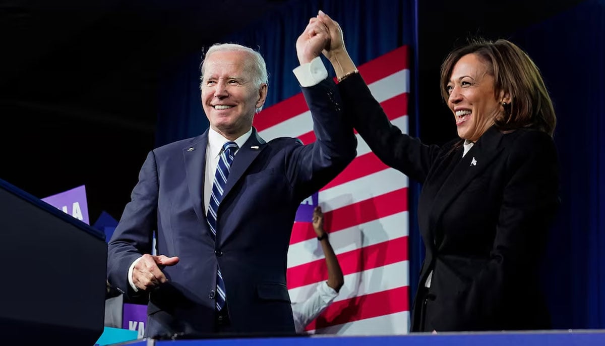 US President Joe Biden and Vice President Kamala Harris stand on stage together after delivering remarks at the DNC 2023 Winter Meeting in Philadelphia, Pennsylvania, US on February 3, 2023. — Reuters