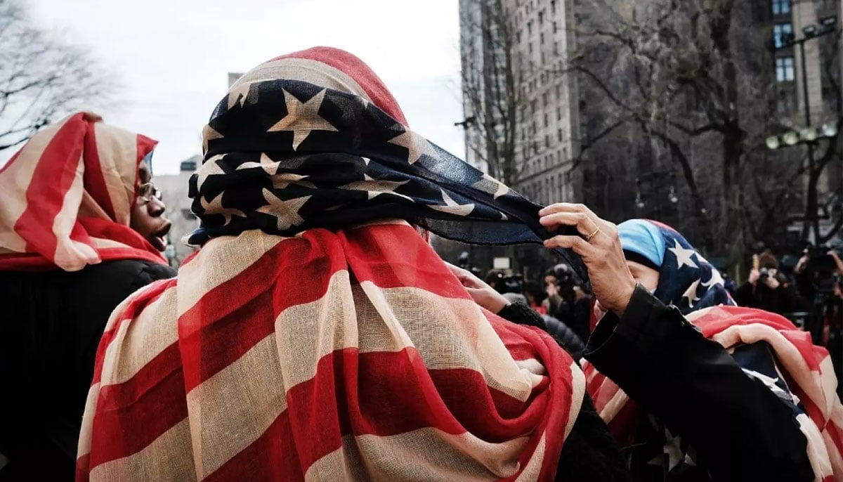 Women wear American Flag headscarves at an event at city hall in New York City, US. — AFP/File