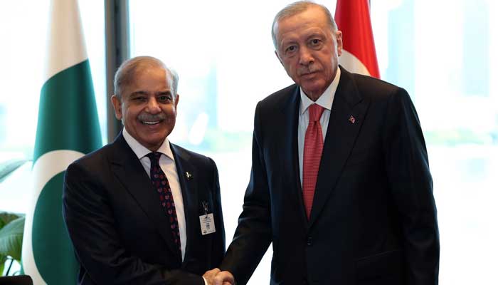 Prime Minister Shehbaz Sharif (left) shakes hand with Turkish President Tayyip Erdogan on UNGA sidelines in New York on September 25, 2024. — X/@CMShehbaz