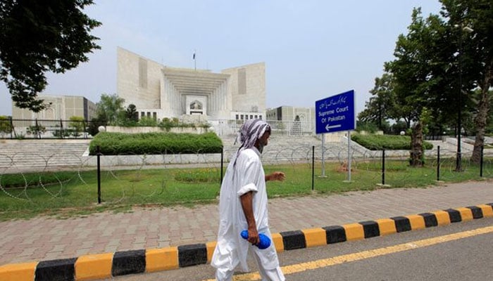 A man walks past the Supreme Court building in Islamabad, Pakistan, June 27, 2016. — Reuters