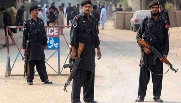 A representational image showing security forces personnel standing guard at a checkpoint. — APP/File