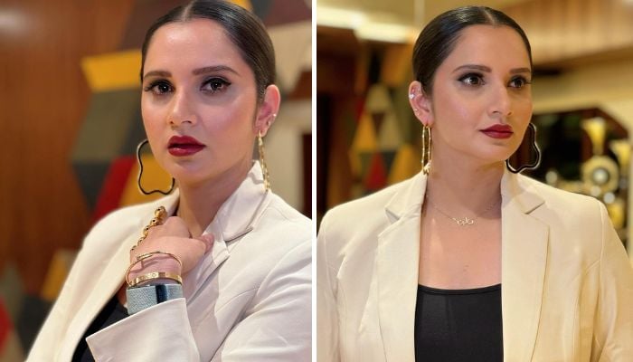 Sania Mirza gestures for photographs in classic red lipstick. — Instagram/@mirzasaniar