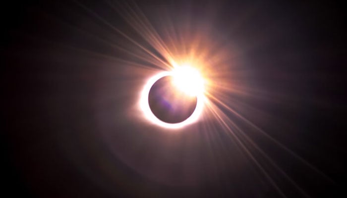 A representational image of a solar eclipse. — Unsplash