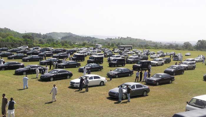 People visit an auction of government owned used cars at the premises of Prime Minister House in Islamabad, Pakistan, on September 17, 2018. — Reuters