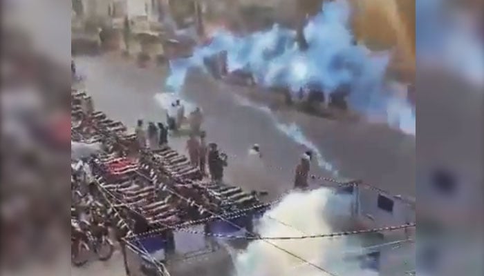 Police fire tear gas shell to disperse PTI supporters in Faisalabad on October 2, 2024. — X/@PTIFaisalabadPK