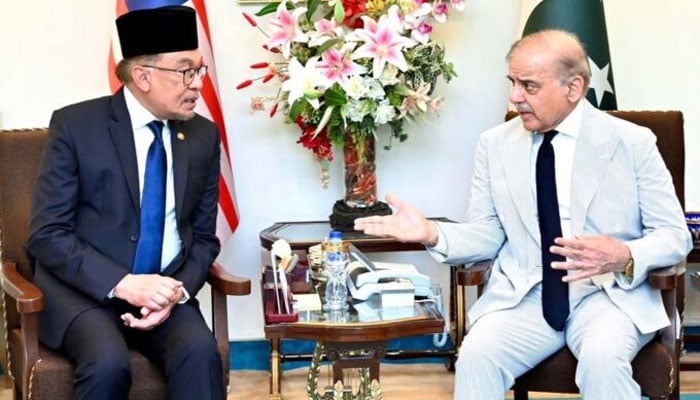 PM Shehbaz Sharif (right) meets his Malaysian counterpart Dato Seri Anwar Ibrahim in Islamabad on October 3, 2024. — PMO