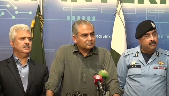 Interior Minister Mohsin Naqvi (Centre) addressing a press conference in Islamabad on October 3, 2024. — Screengrab via Geo News