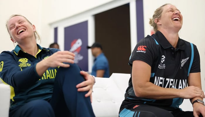 Alyssa Healy of Australia (L) and Sophie Devine of New Zealand laughing during an event of the ICC Womens T20 World Cup 2024 on October 2, 2024. — ICC