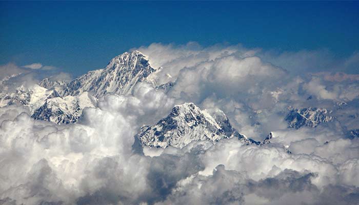 Mount Everest or Sagarmatha (top), highest peak in the world with an altitude of 8.848 metres (29.028 ft) is seen in this aerial view next to 6.812 metres (22.349 feet) high Mount Ama Dablam (bottom R) April 22, 2007. — Reuters