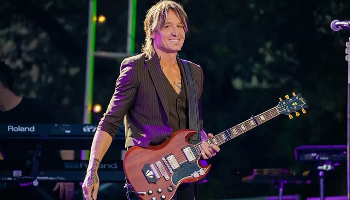 Keith Urban hopes daughter can keep balance amid her runway debut