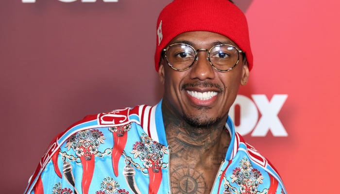 Nick Cannon pulls off father duties for sons basketball game