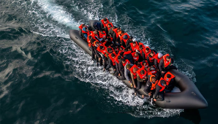 A representational picture shows a drone view of an inflatable dinghy carrying migrants making its way from France towards England in the English Channel, Britain, May 4, 2024. — Reuters