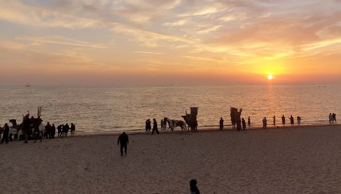 A view of sunset during cloudy weather of summer season at Manora Beach in Karachi on July 8, 2023. —PPI