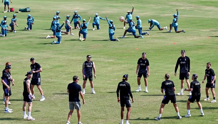 England (front) and Pakistan teams attend a practice session ahead of their first Test match at the Multan Cricket Stadium in Multan on October 5, 2024. —AFP